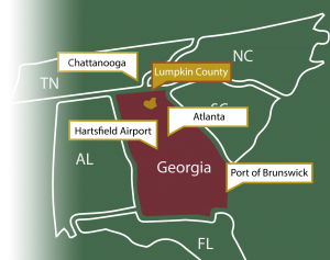 A map showing lumpkin county in relation to Atlanta, Hartsfield Jackson International Airport, Port of Savannah, Alabama, South Carolina, North Carolina and Tennessee.